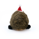 Rear view of a fluffy round Holiday Hedgehog - XL wearing a red Santa hat and having small black ears. The toy is positioned against a white background.
