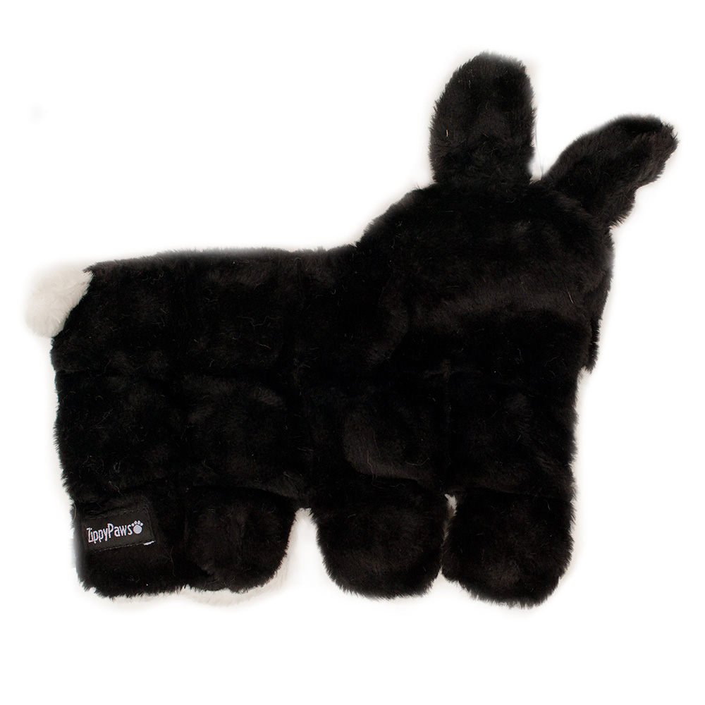 A black plush toy shaped like a sheep or llama with a "ToppyPaws" label on it.