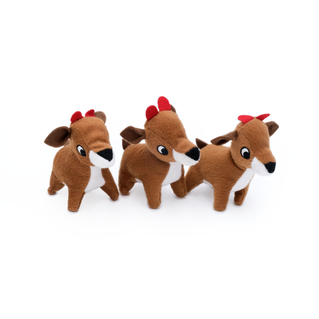 Three Holiday Burrow® - Reindeer Pen with red antlers and white underbellies are standing in a row on a white background.
