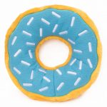 A round plush toy resembling a donut with a blue top decorated with white sprinkles and a yellow base.