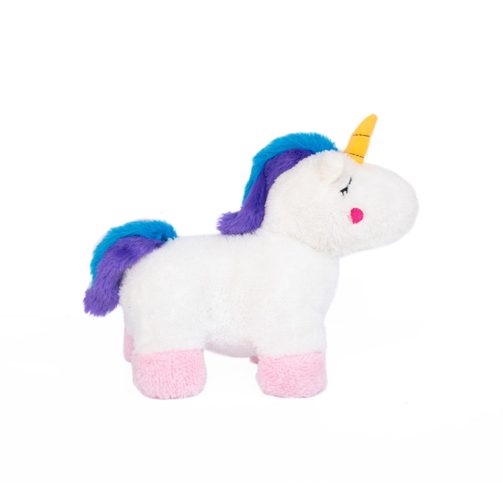 A plush toy unicorn with a white body, pink hooves, blue and purple mane and tail, and a yellow horn.