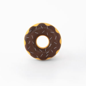 A top view of a chocolate frosted donut with sprinkles, isolated on a white background.