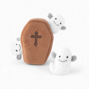 Plush toy set featuring a soft brown coffin with a dark cross on it, and three smiling white ghost-like figures partially inside and outside the coffin.