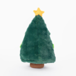 A plush toy in the shape of a green Christmas tree with a yellow star on top and a brown base, viewed from the back.