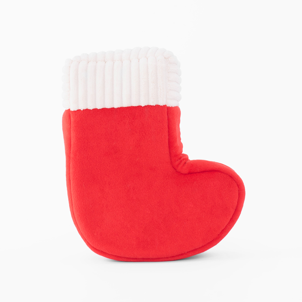 A red plush Christmas stocking with a white, ribbed cuff against a plain white background.