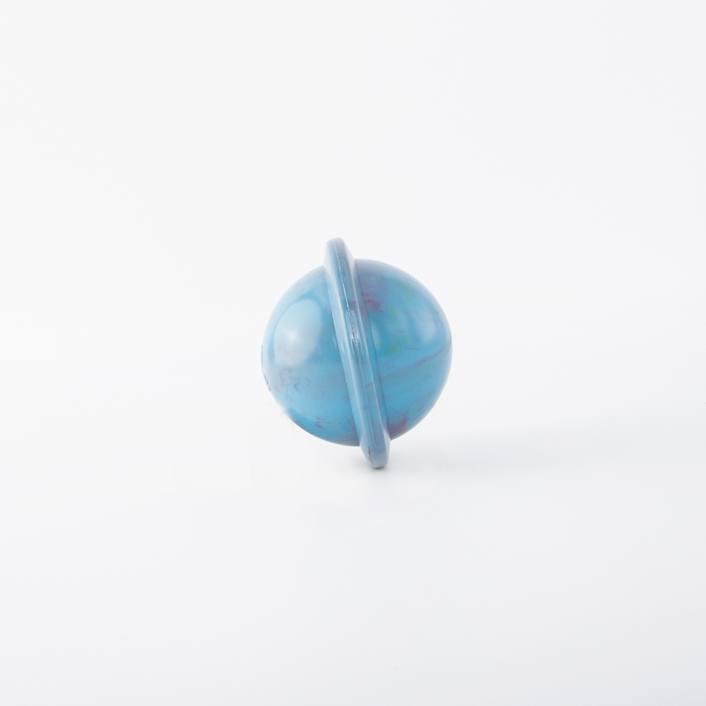 A blue, spherical bouncing toy with a ring around its middle is placed on a white background.