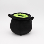 A black plush cauldron with a green interior sits against a plain white background.