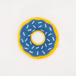 A blue and yellow donut-shaped toy with white sprinkles lies on a white background.