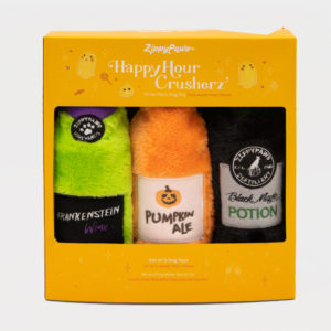 A package of three ZippyPaws branded dog toys labeled "Frankenstein Wine," "Pumpkin Ale," and "Black Magic Potion," displayed in a yellow box with "Happy Hour Crusherz" text and ghost graphics.
