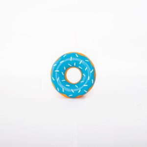 A blue donut-shaped inflatable pool ring with sprinkled patterns on a white background.
