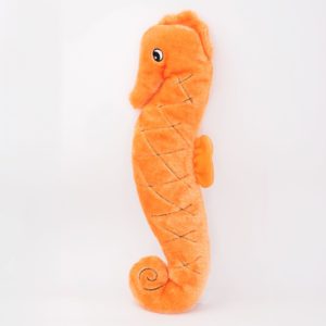 A plush orange seahorse toy with a curved tail and stitched detailing on a plain white background.