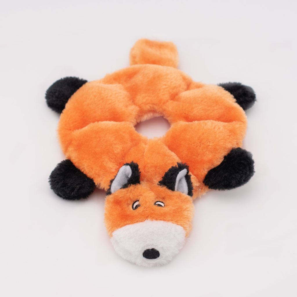 A plush orange fox chew toy with black feet and a white face designed for pets.