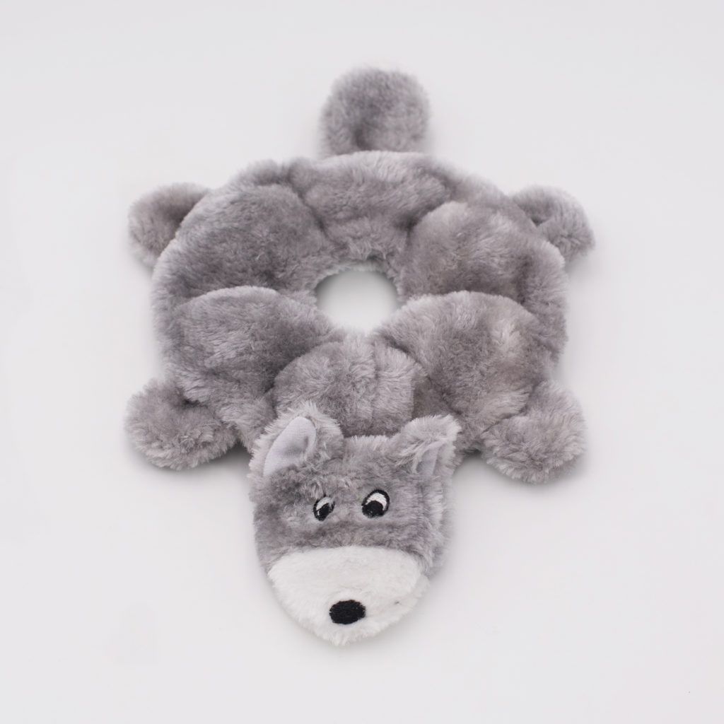 A plush gray toy shaped like a ring with a stuffed animal head that resembles a wolf on one side.