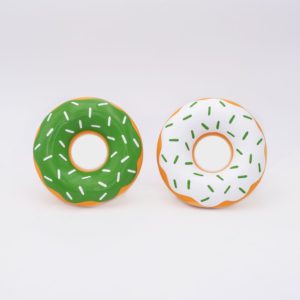 Two inflatable pool floats shaped like donuts. One is green with white sprinkles, and the other is white with green sprinkles. They are positioned side by side against a plain background.
