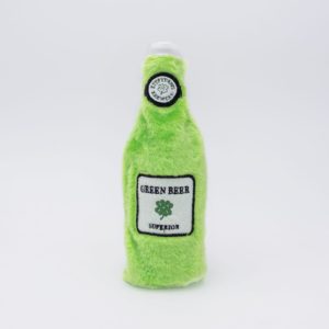 A plush toy designed to resemble a green beer bottle with the label "Green Beer" and a four-leaf clover graphic.