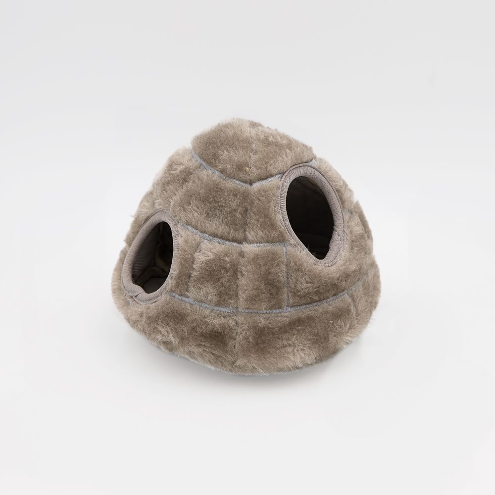 A small, dome-shaped pet bed with two round openings, made of soft, light brown plush material.