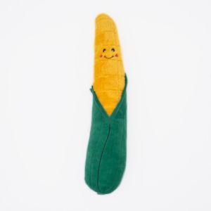 A Jigglerz® - Corn resembling an ear of corn with a smiling face and blush marks. The corn is yellow and partially encased in a green, leafy husk.