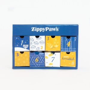 A blue and white 8 Nights of Hanukkah Box labeled for Hanukkah, featuring eight numbered compartments with festive designs.