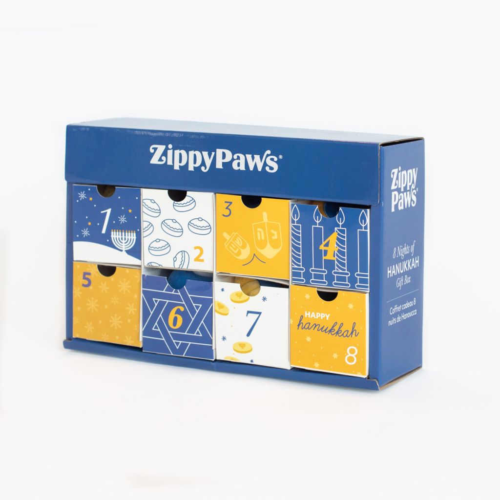 A colorful 8 Nights of Hanukkah Box with eight numbered compartments, each decorated with different Hanukkah-themed illustrations such as menorahs, dreidels, and stars.