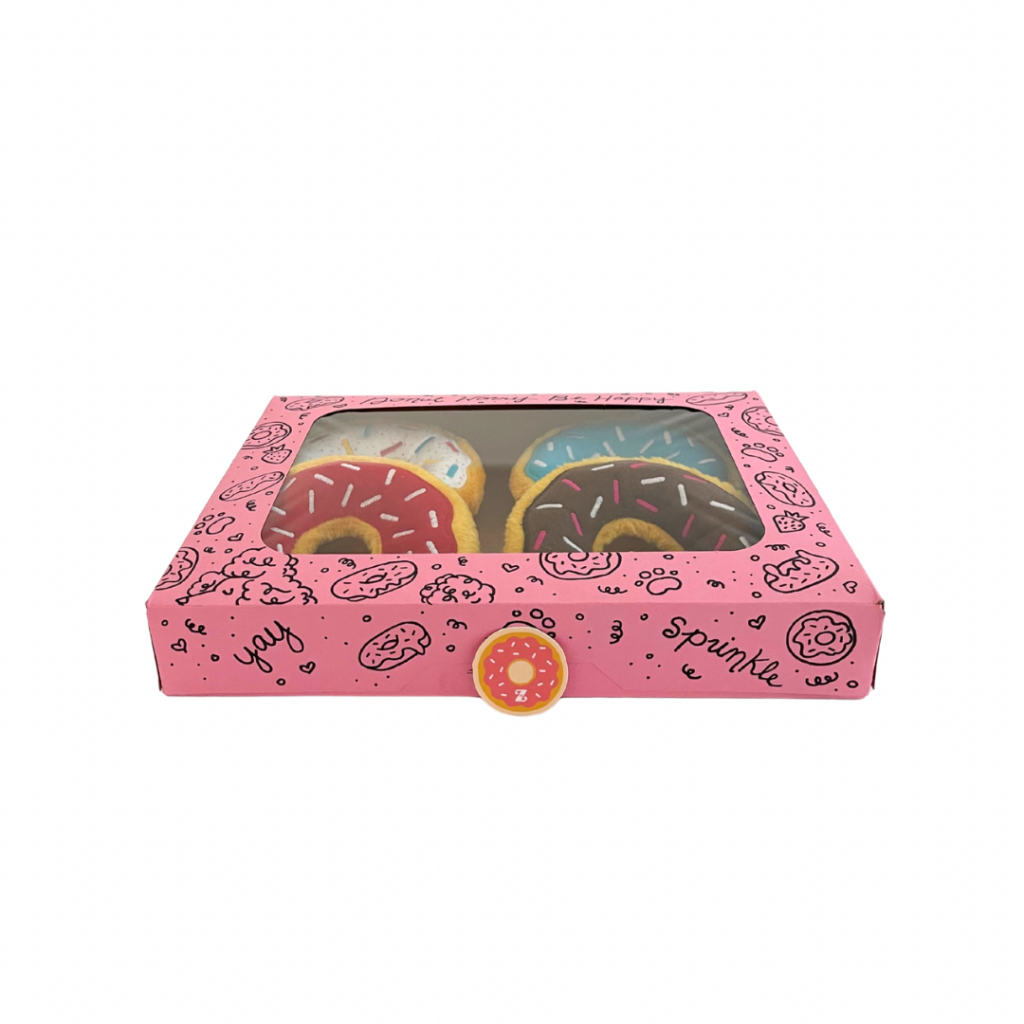 A case of four donut toys, red, brown, blue and white