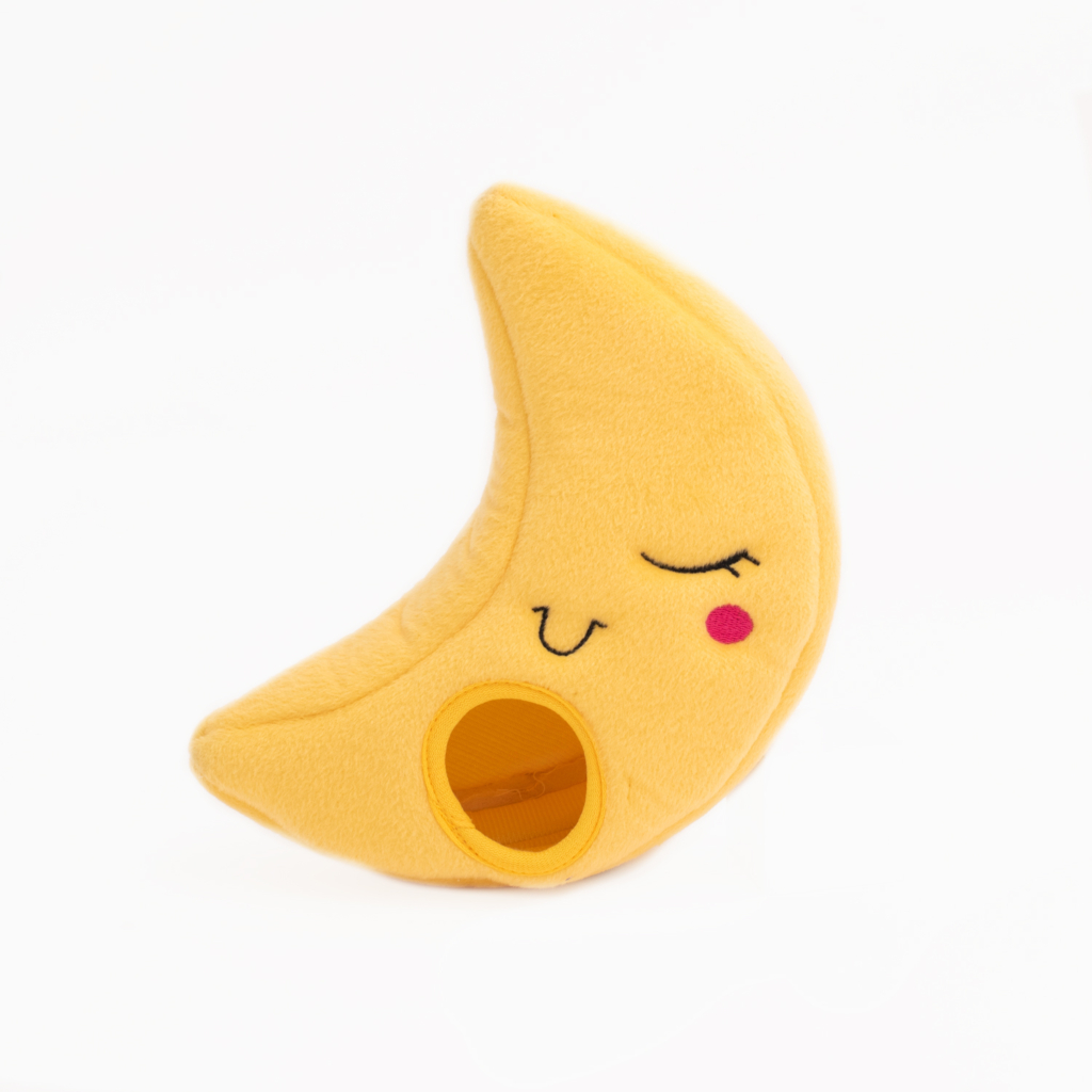 A yellow crescent moon-shaped plush toy with a smiling face and rosy cheeks, Zippy Burrow® - To the Moon.
