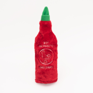 Red plush toy shaped like a hot sauce bottle with a green cap, labeled "Hot Sauce Crusherz - Red Rooster.