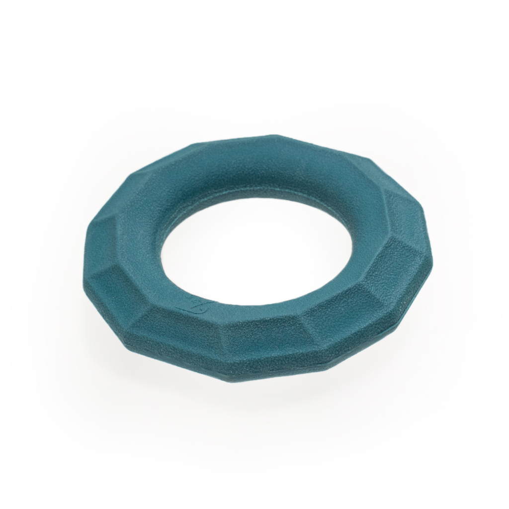 A ZippyTuff+ Emerald Ring with a textured surface and a central circular opening.