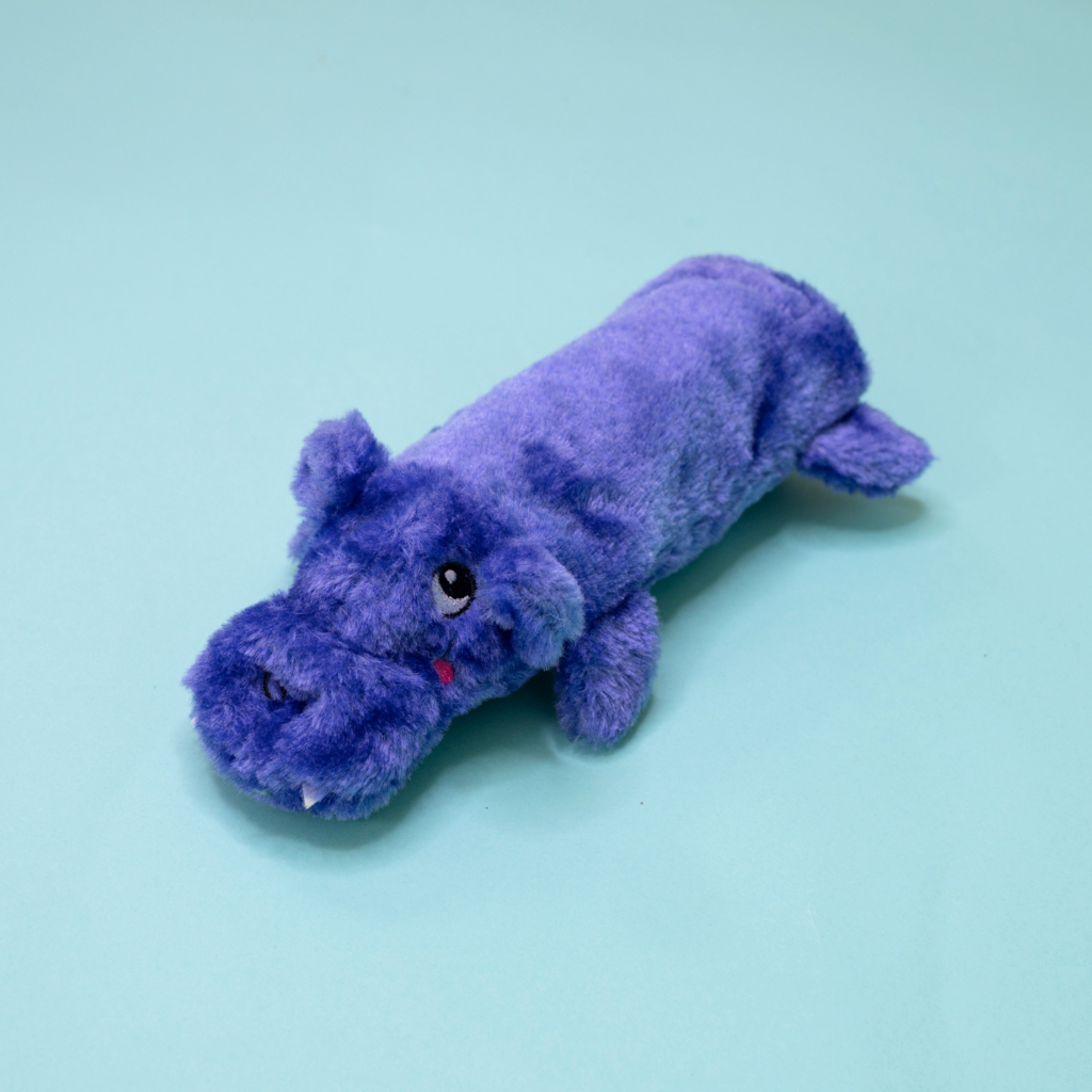 A Bottle Crusherz - Hippo lies on a light blue background.