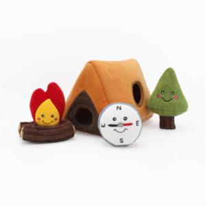 Plush toys including a campfire, compass, tent, and tree on a white background.