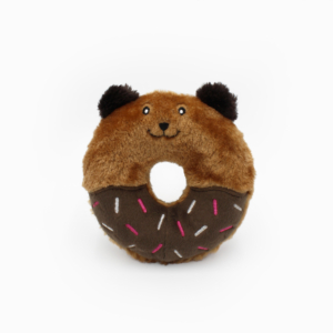 A plush toy shaped like a donut with bear ears, a bear face, and colorful sprinkles on the bottom half.