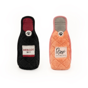 Two Z-Stitch® Happy Hour Crusherz 2-Pack - Merlot and Rosé, one labeled "Merlot" and the other "Rosé Sparkling." Each toy has a paw print design near the bottle's neck.