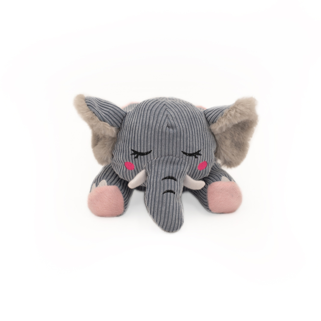 A small, plush Snooziez with Shhhqueaker - Elephant with closed eyes, pink cheeks, and grey corduroy fabric, sits on a white background.