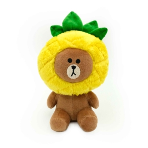 A LINE FRIENDS BROWN Plush - Pineapple Party wearing a yellow sunflower costume with green leaves on its head, sitting against a white background.