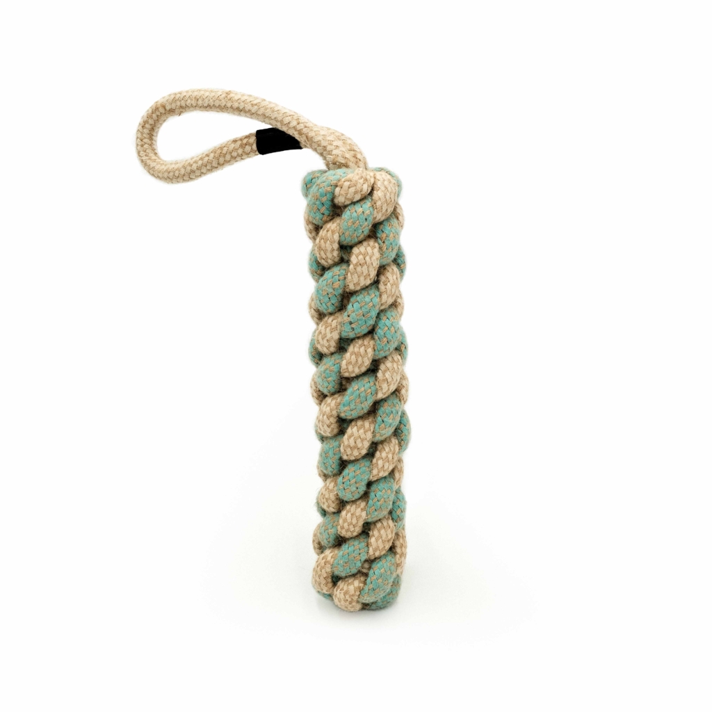 The ecoZippy Cotton and Jute Tug is a cylindrical, handwoven, rope dog toy with a loop handle. The toy features interwoven beige and light blue ropes.