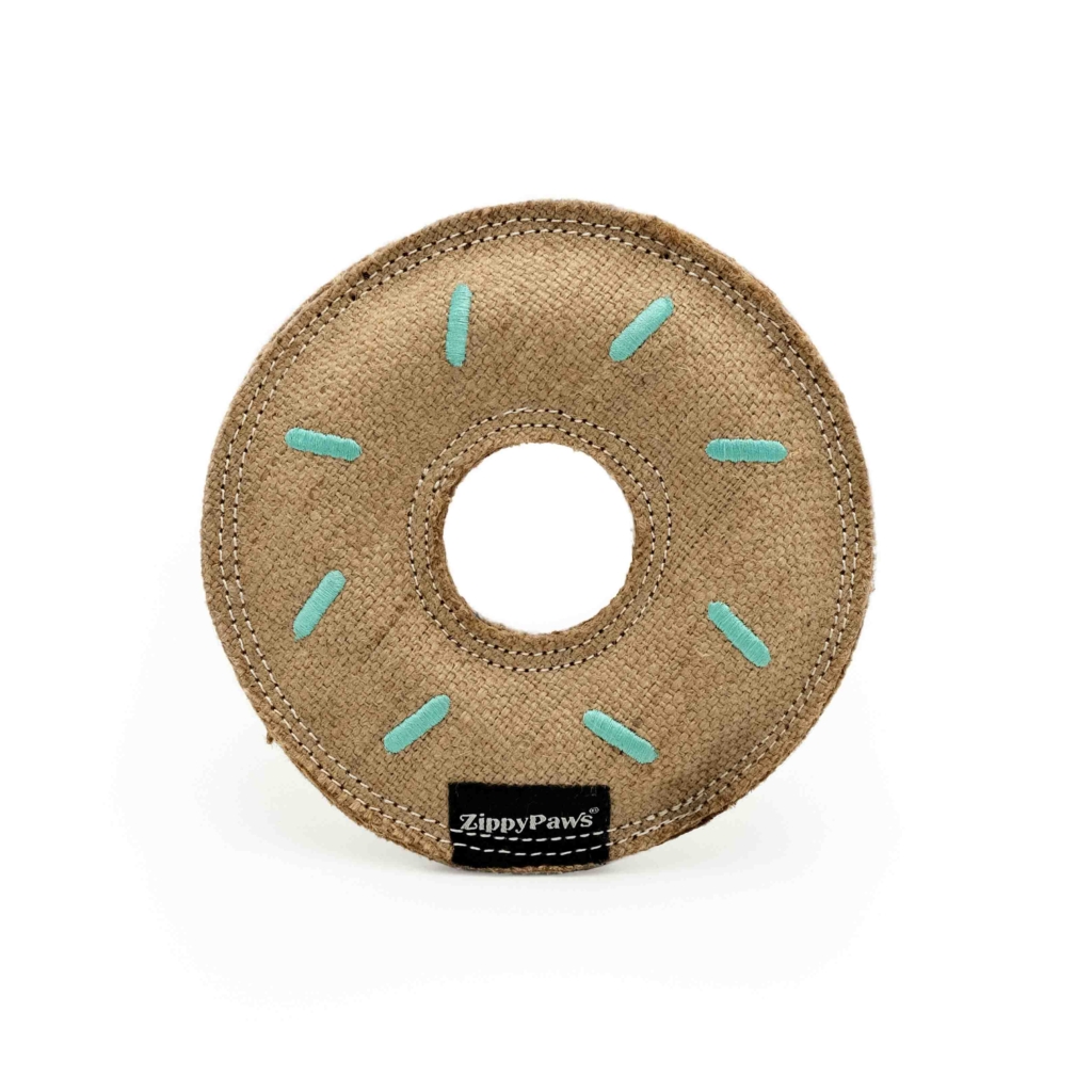 A round, brown fabric toy resembling a donut, with blue stitching details and a central hole, labeled 