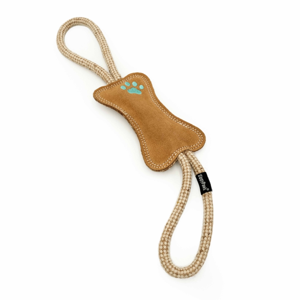 A ecoZippy Jute RopeTugz® with a brown, bone-shaped center and two rope loops, one on each end. The center has a blue paw print and a black tag with text on the side.