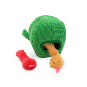 A green, fabric fish-shaped cat toy with an opening, partially revealing an orange plush toy inside. A red plush toy lies next to it. ZippyClaws® Burrow® - Snakes in Cactus snakes out from the lush cactus toy.