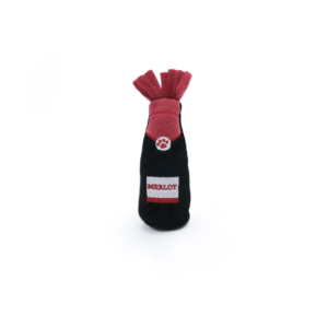 Plush toy shaped like a bottle of Merlot wine, colored in black and red, with a red label reading "ZippyClaws® Catnip Crusherz - Merlot".