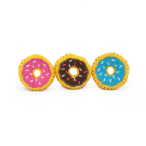 Three **ZippyClaws® Mini Donutz 3-Pack** plush toy donuts with yellow borders and sprinkles, colored pink, brown, and blue from left to right, set against a white background.