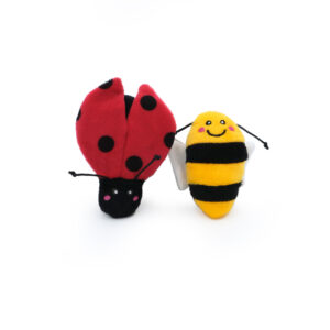 Two stuffed toys: a red and black ladybug on the left and a yellow and black bee with a smiley face on the right, both isolated on a white background. ZippyClaws® 2-Pack - Ladybug and Bee.