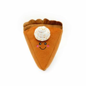 A NomNomz® - Pumpkin Pie Slice, in the shape of a pie slice with whipped cream on top, featuring a smiling face with rosy cheeks.