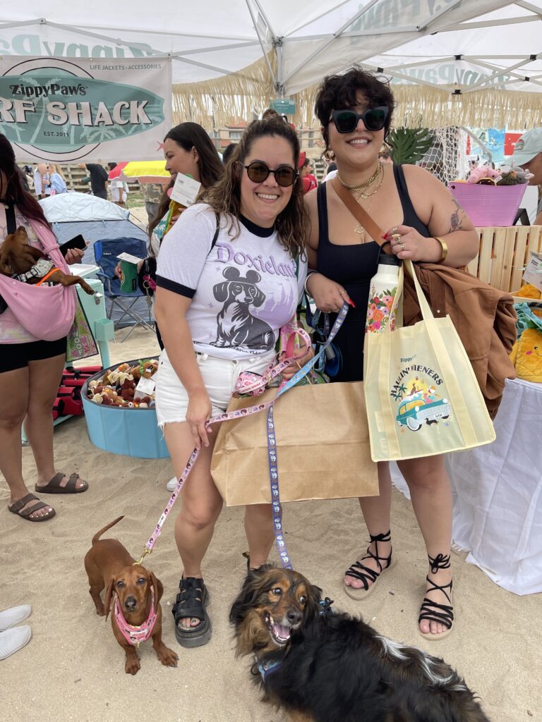 Pet owners with dachshunds