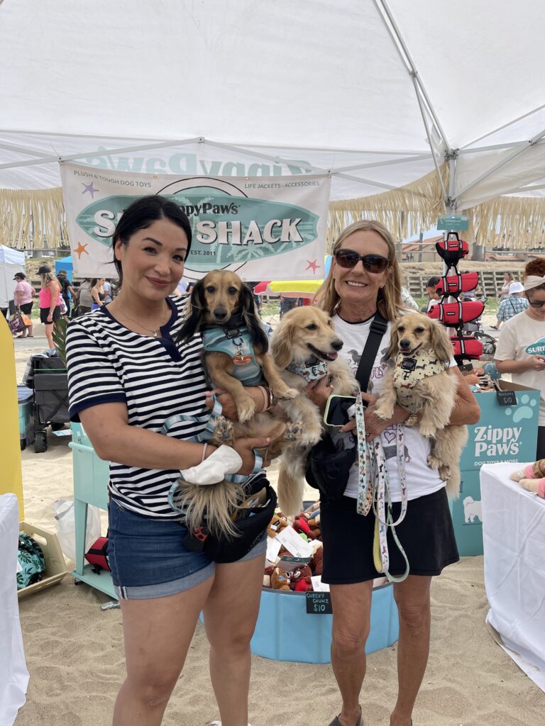 Pet owners with dachshunds