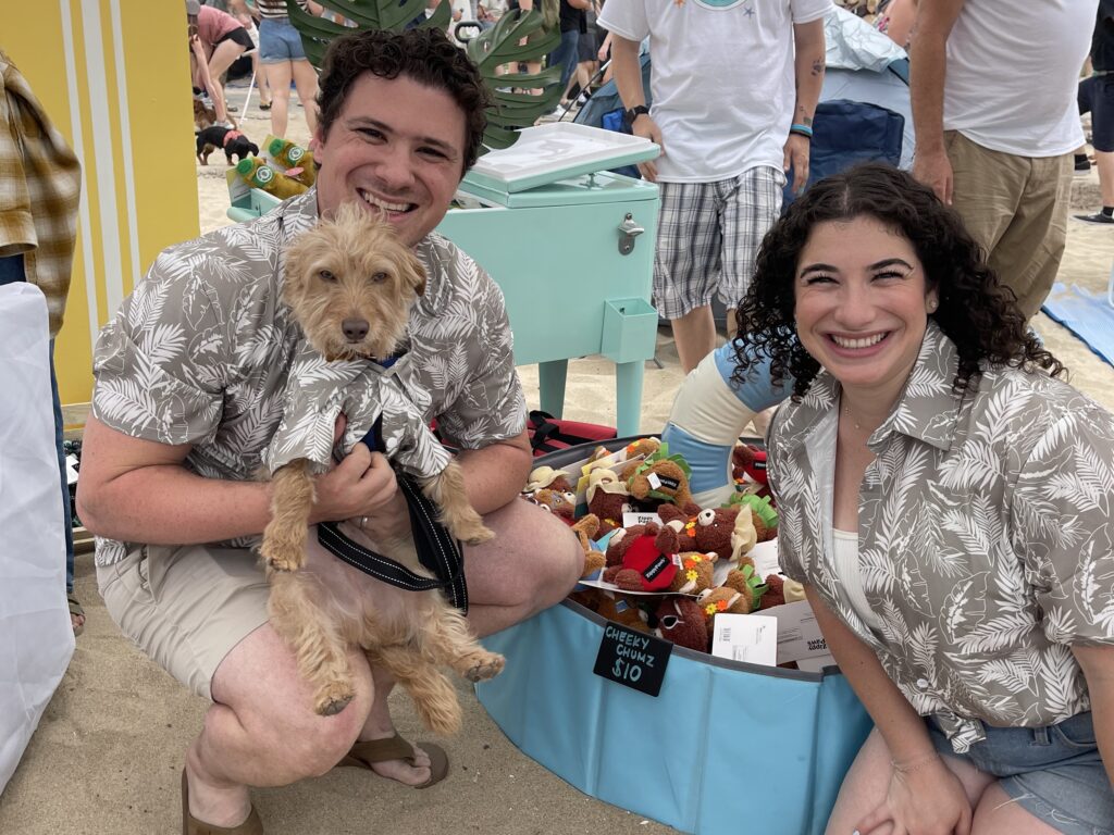 Pet Parents and Dachshund in matcing shirts