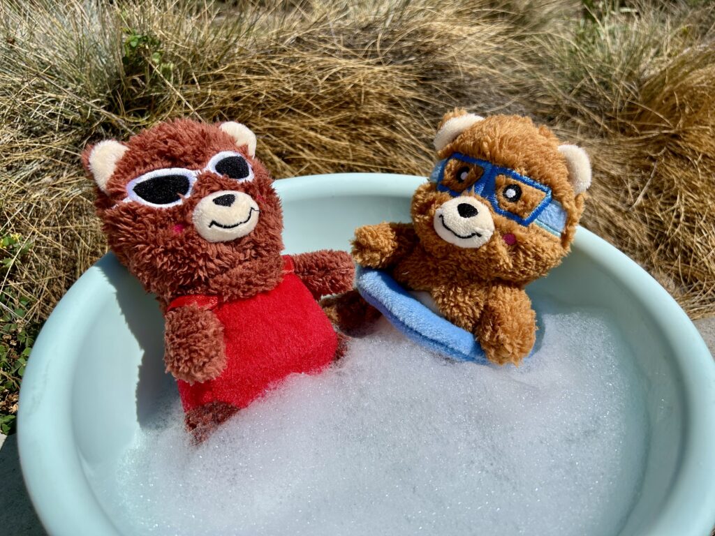 Cheeky Chumz Jr Poolside Fun toys in a bubbly wash basin.