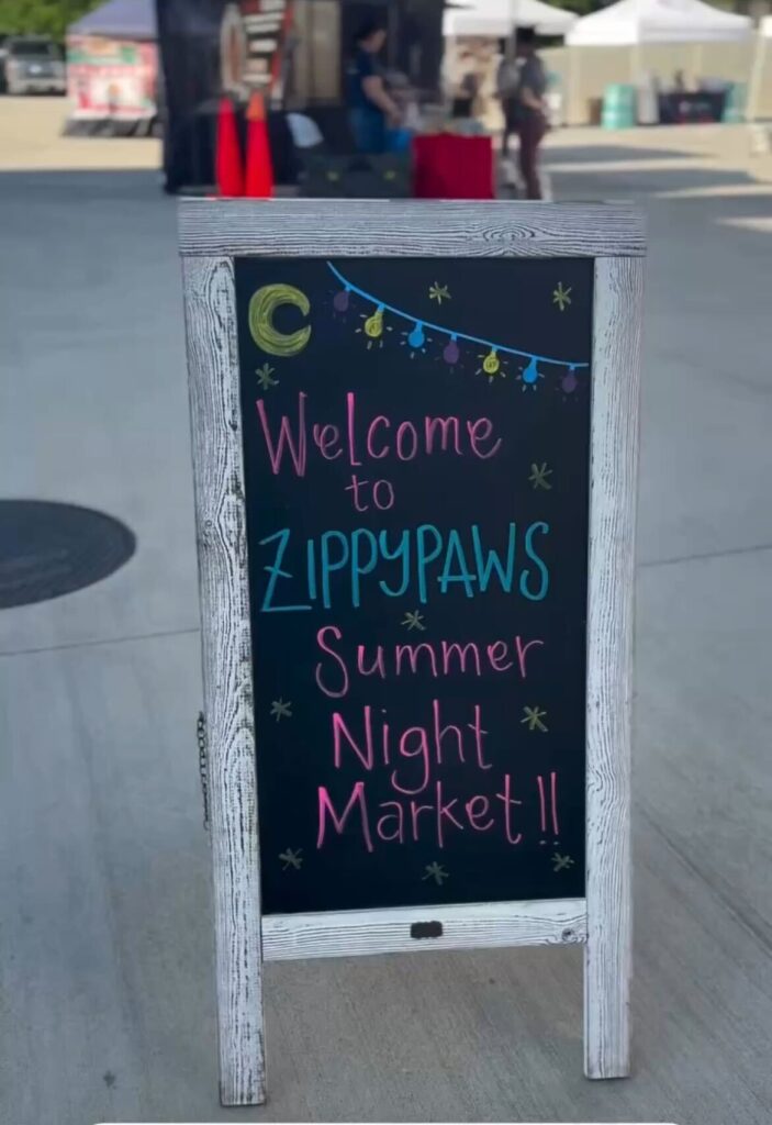 Summer Night Market Welcome Sign