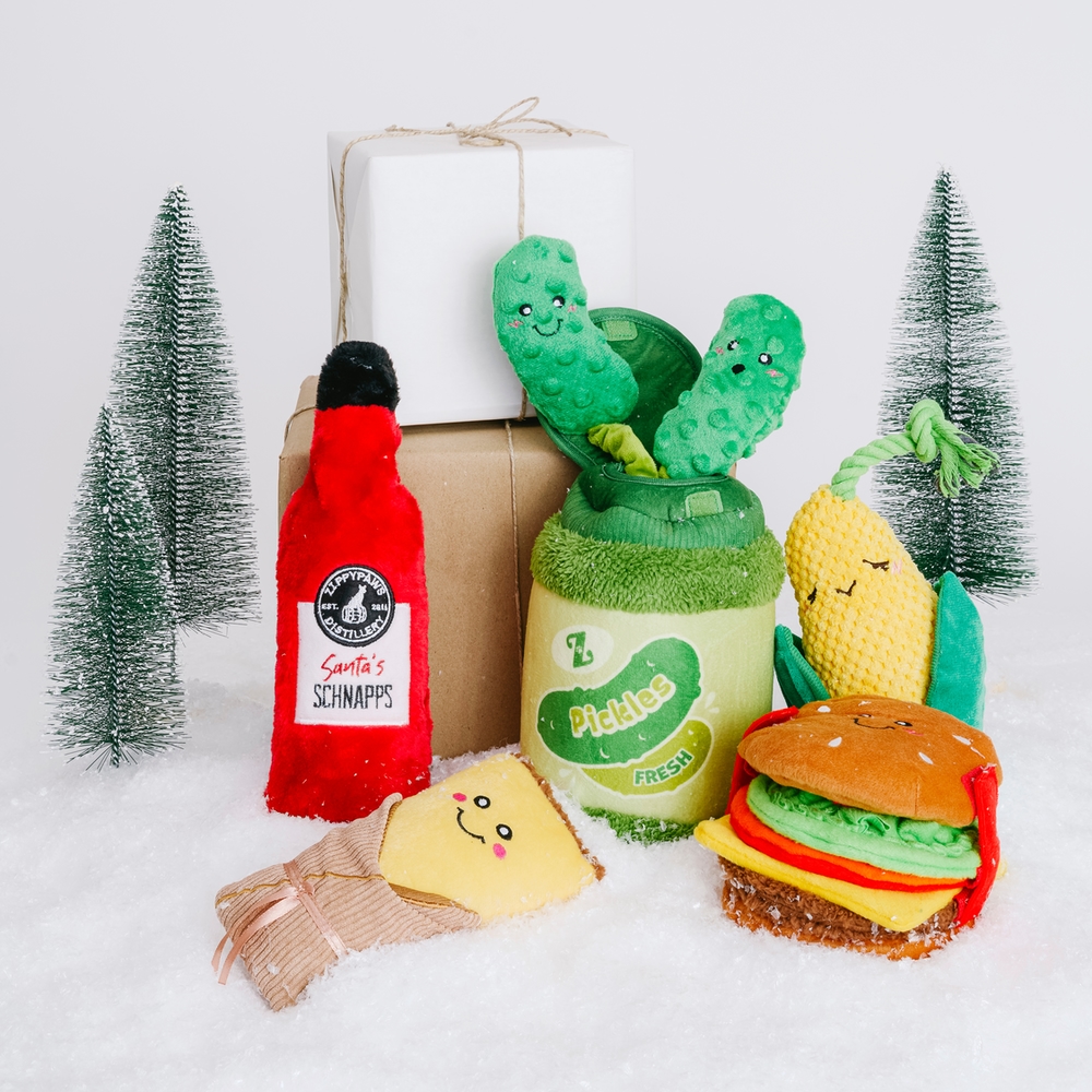 Display of food related dog toys. Jar of pickles Hamburger, Corn and tamale
