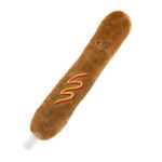 The Jigglerz® - Rocket Pop is a plush toy shaped like a rocket pop with a smiling face, colorful embroidery, and a white stick at the end.