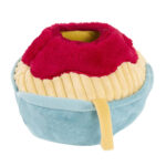Zippy Burrow® - Zippy Meal is a plush toy shaped like a dessert, featuring a blue base, yellow bottom, and red topping with soft textured materials.