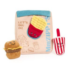 Plush toys shaped like a hamburger, fries, and a popsicle with smiling faces, arranged in front of the Zippy Burrow® - Zippy Meal soft bag featuring the phrases “MhZIPPY’s” and “LET’S DIG IN!”.